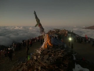 Trekking above clouds on Mardi Himal with Machhapuchhre peak in view