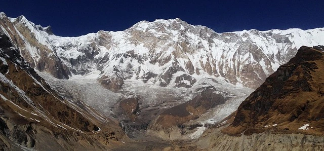 Annapurna mountain range with glaciers and snowfields illustrating the cold alpine climate and weather conditions