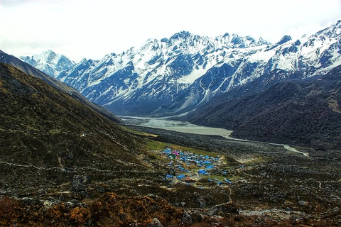Panoramic view of Langtang Valley village surrounded by high Himalayan mountains along the Langtang Gosaikunda trek route