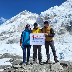 group of trekkers from himalayanhero adventures taking success photo on everest base camp