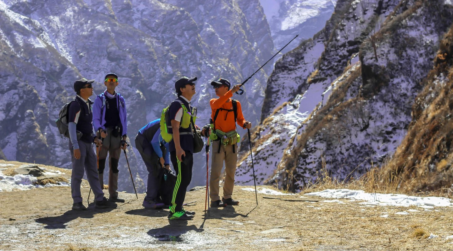 group-of-trekkers-walking-on-the-tral-of-north-annapurna-base-camp