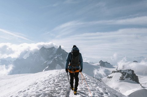 Snow-covered trail leading to Larkya La Pass on Manaslu Circuit.