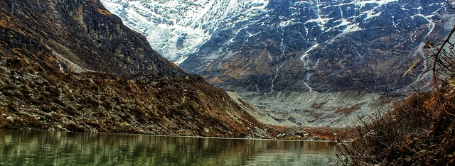 Sacred Gosaikunda Lake with snow-capped peaks in the Langtang Helambu trekking region