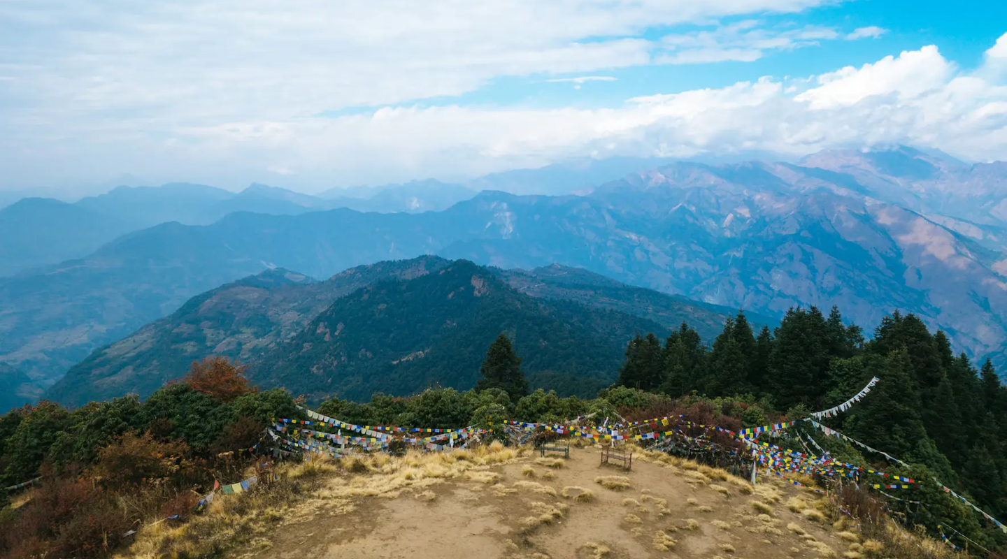 Trekking path leading through hills and forests to Poon Hill