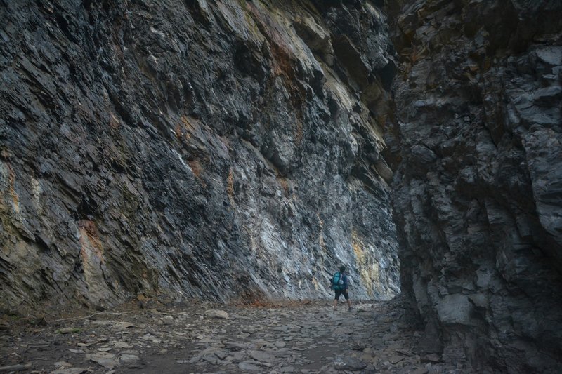 Hiking through a rocky landscape with panoramic views.