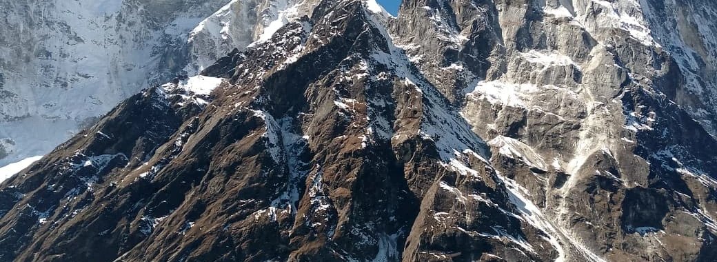 trekkers enjoying the view of beautiful mountains in nepal trekking