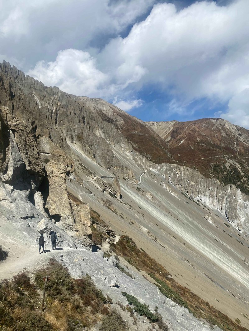 "Stone steps on Annapurna Circuit trek route leading to high altitude mountain pass in Nepal Himalayas"