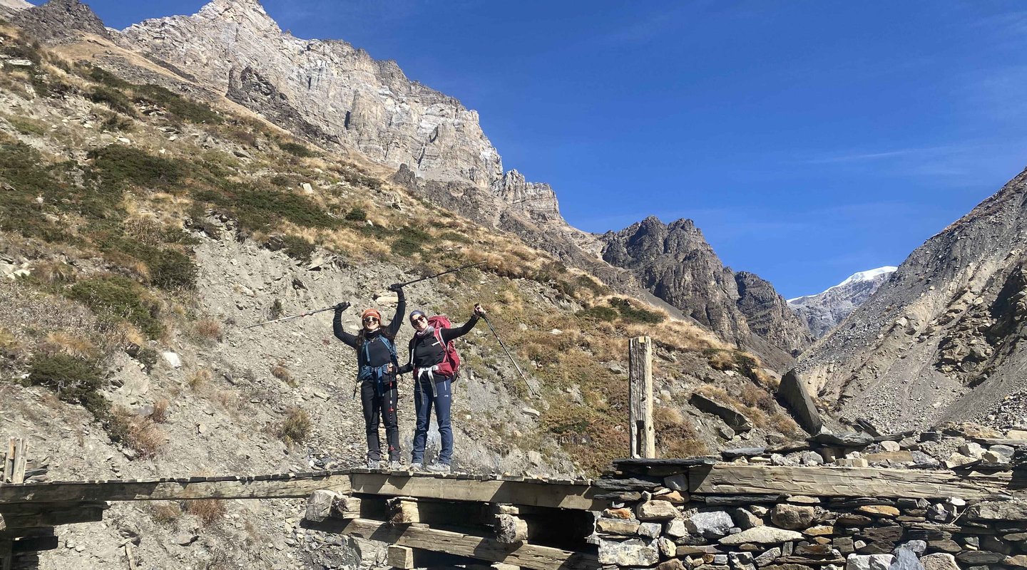 our-clients-from-himalayan-hero-adventures-crossing-wooden-bridge-in-annapurna-circuit