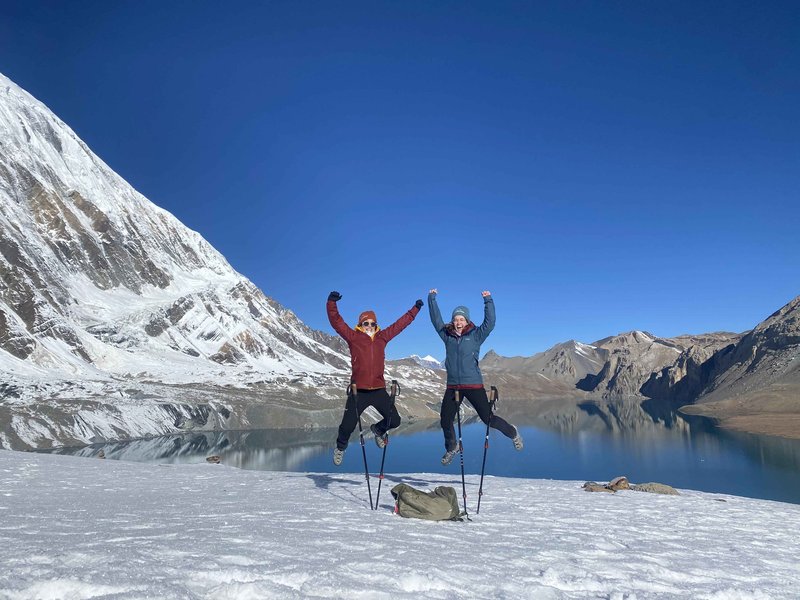 two-trekkers-from-himalayan-hero-adventures-enjoying-at-tilicho-lake-min