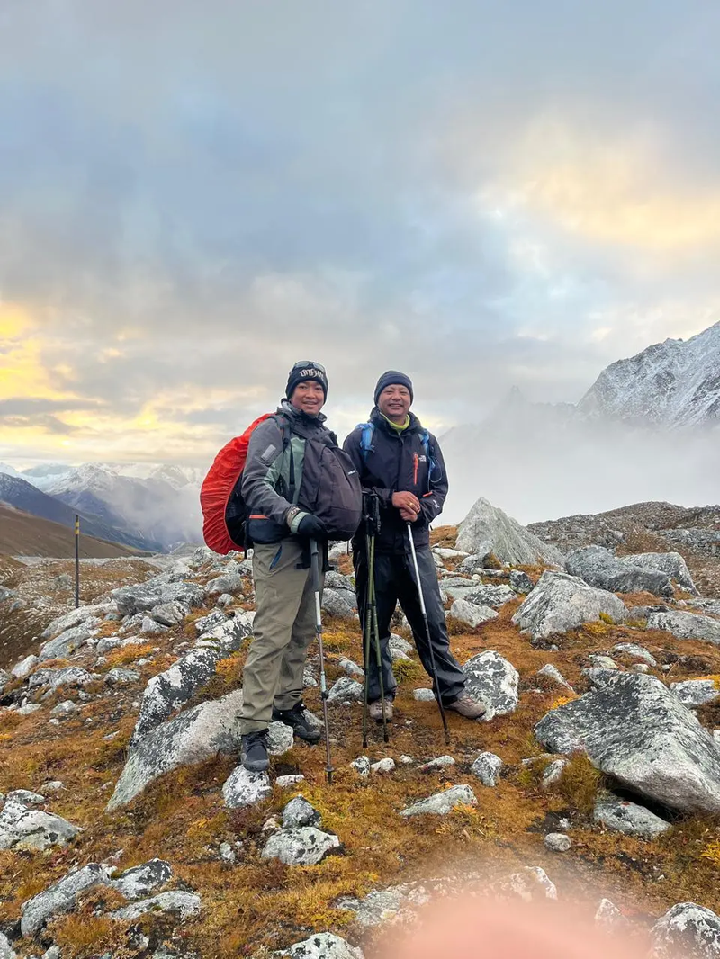 Trekkers enjoying the Short Manaslu Circuit Trek with mountain views in the Manaslu region of Nepal.