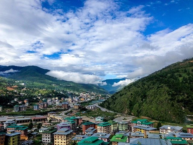 Thimphu city view with mountains and cultural landmarks during Bhutan tour package